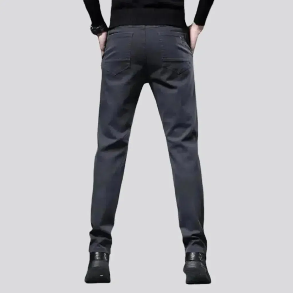 Dark men's mid-waist jeans